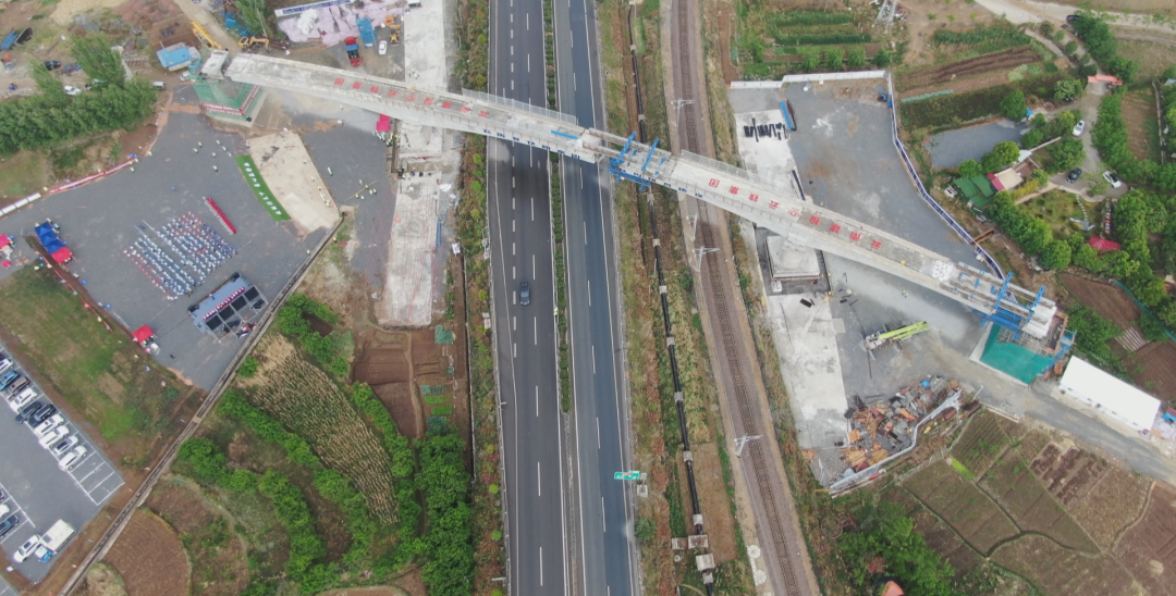 1650594309968304.png 2022-04-18-國內首座!祥云財富工業園區鐵路專用線茨坪村特大橋轉體成功.png